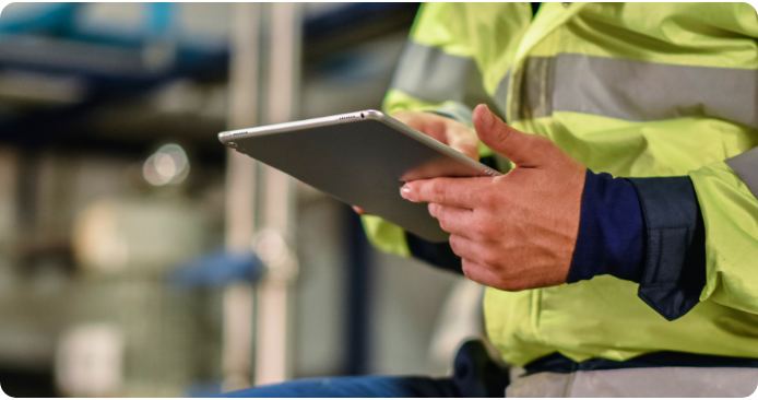 Worker Clocking In on tablet.png